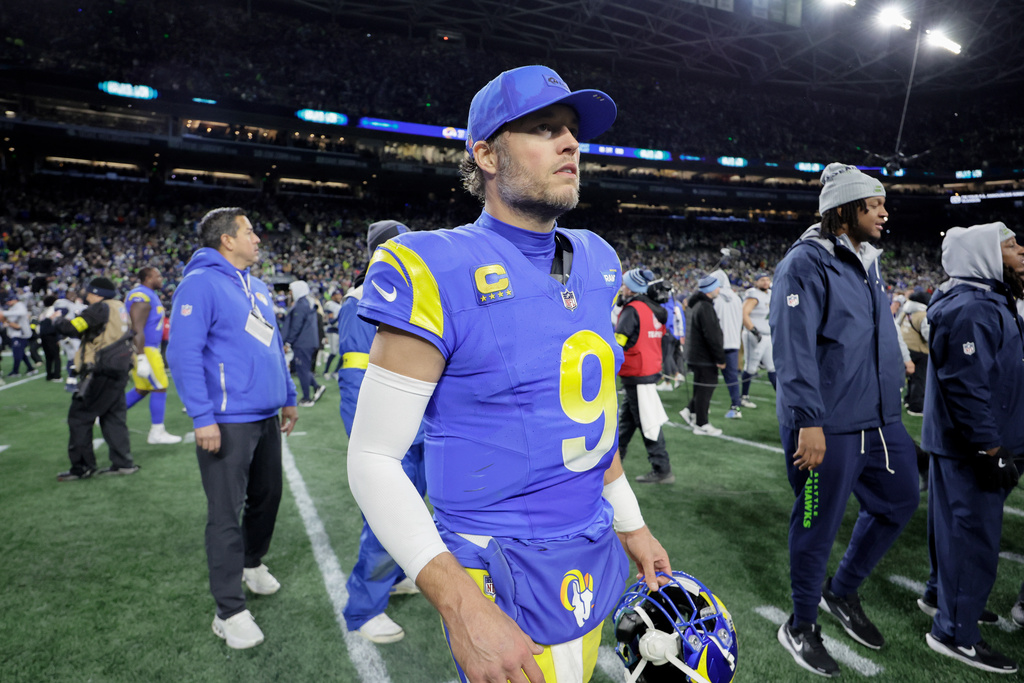 Los Angeles Rams quarterback Matthew Stafford (9) leaves the field after an NFL football game against the Seattle Seahawks, Thursday, Dec. 18, 2025, in Seattle. (AP Photo/John Froschauer)