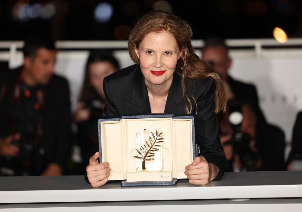 FILE - Justine Triet, winner of the Palme d'Or for "Anatomy of a Fall," poses for photographers during a photo call following the awards ceremony at the 76th international film festival, Cannes, southern France, on May 27, 2023. (Photo by Vianney Le Caer/Invision/AP, File)