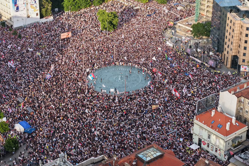 Anti-government protesters take part in a rally led by Serbia's protesting university students who are pushing for major political changes in the Balkan country run by President Aleksandar Vucic, in Belgrade, Serbia, Saturday, May. 23, 2026. (AP Photo/Armin Durgut)
