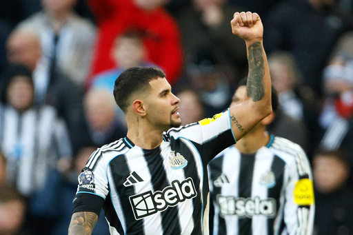Newcastle United's Bruno Guimaraes celebrates scoring during the English Premier League soccer match between Newcastle United and Fulham at St James' Park, Newcastle-upon-Tyne, England, Saturday Oct. 25, 2025. (Richard Sellers/PA via AP) Newcastle United's Bruno Guimaraes celebrates scoring during the English Premier League soccer match between Newcastle United and Fulham at St James' Park, Newcastle-upon-Tyne, England, Saturday Oct. 25, 2025. (Richard Sellers/PA via AP)