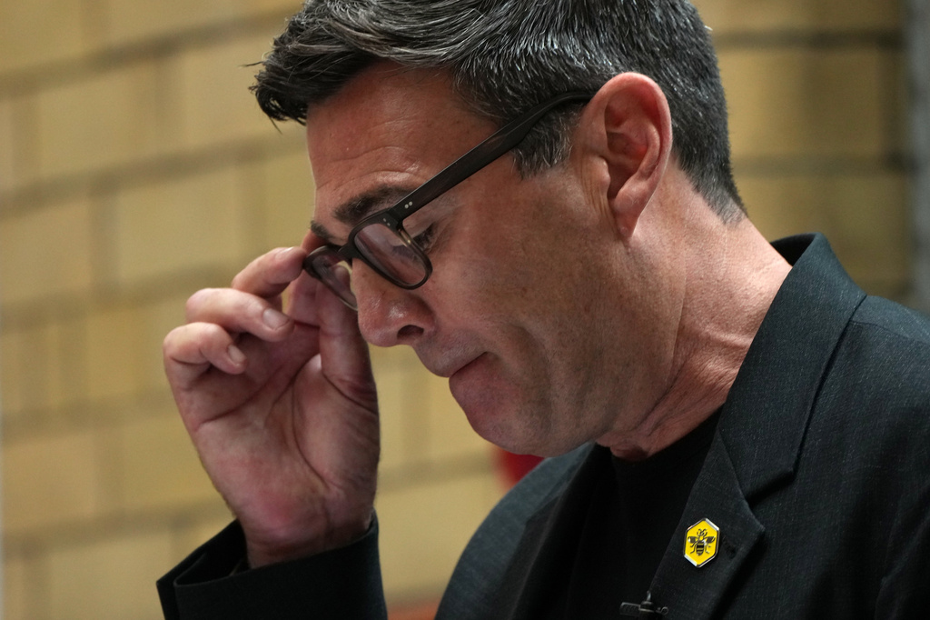 Labour party's Andy Burnham adjusts his glasses as he delivers a speech at the People's History Museum in Manchester, England, Monday, June 29, 2026.(AP Photo/Alastair Grant)