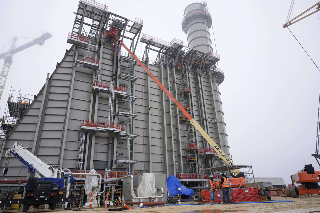 FILE - Construction continues at Entergy's Orange County Advanced Power Station, a 1,215-megawatt facility, Monday, Feb. 24, 2025, in Orange, Texas. (AP Photo/David J. Phillip, File)