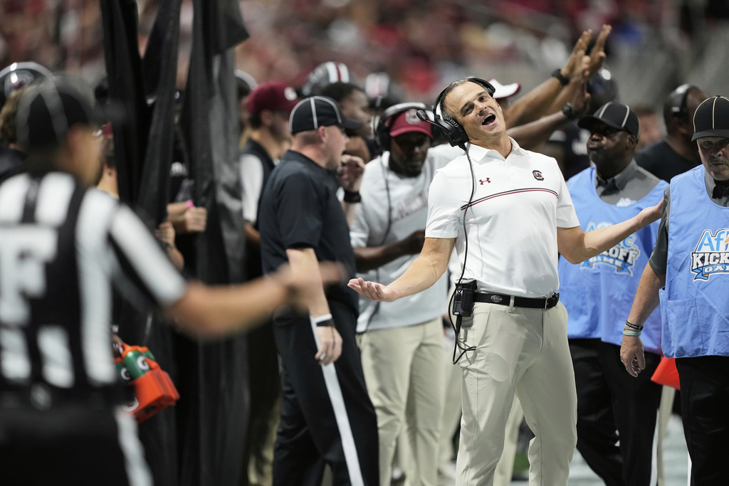 South Carolina head coach Shane Beamer reacts on the sideline during an NCAA college football game against Virginia Tech, Sunday, Aug. 31, 2025, in Atlanta. (AP Photo/Brynn Anderson)