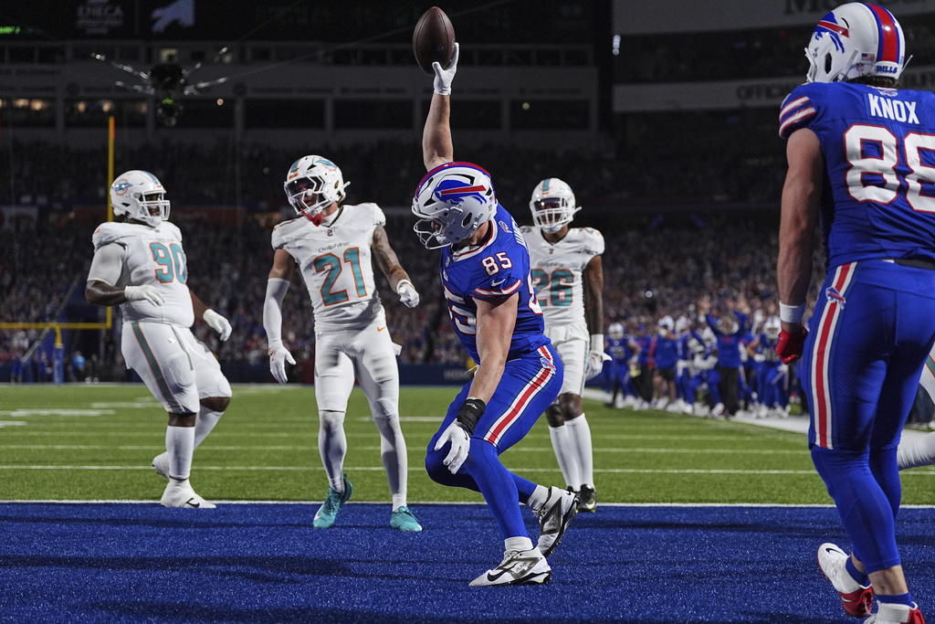 Buffalo Bills tight end Jackson Hawes (85) celebrates after scoring a touchdown against the Miami Dolphins during the first half of an NFL football game, Thursday, Sept. 18, 2025, in Orchard Park, N.Y. (AP Photo/Matt Rourke)