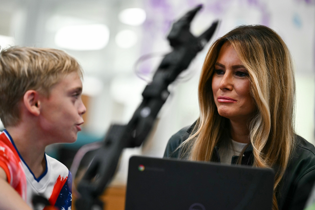 First Lady Melania Trump meets with a student at Mountain View Elementary School in Jefferson, N.C., Tuesday, Sept. 15, 2026. (Kent Nishimura/Pool Photo via AP)