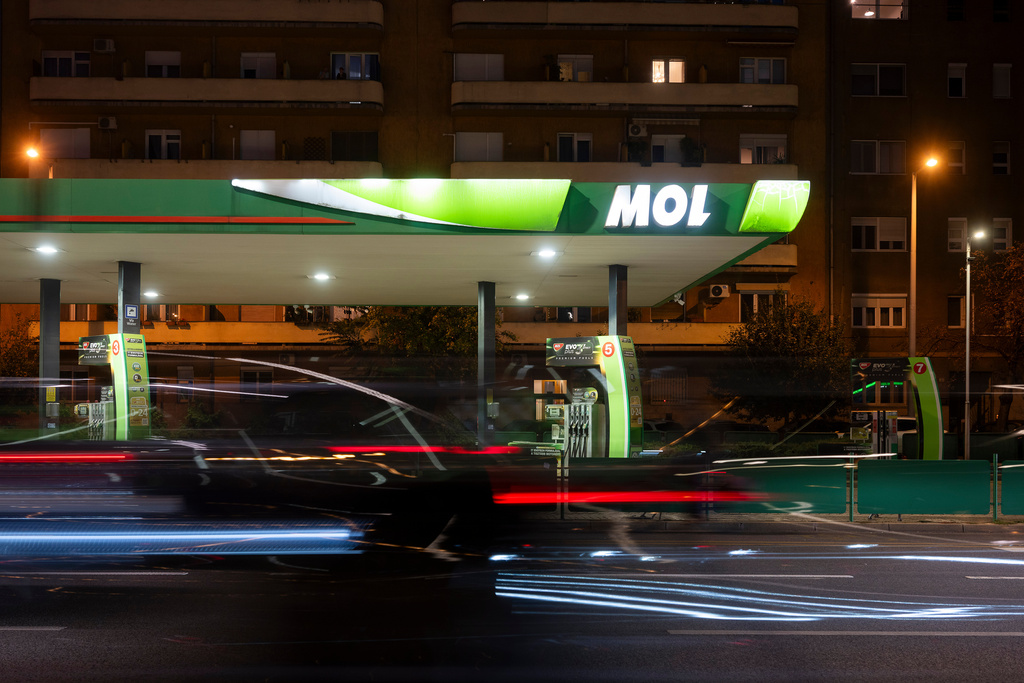 A car drives by a of MOL gas station in downtown Budapest, Hungary, on Sept. 27, 2025. (AP Photo/Denes Erdos)