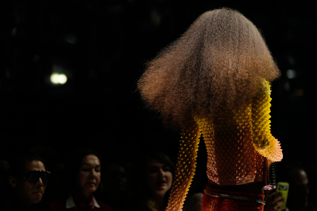 A model wears a creation part of the Roberto Cavalli women's Spring-Summer 2027 collection, presented in Milan, Italy, Thursday, Sept. 24, 2026. (AP Photo/Luca Bruno).