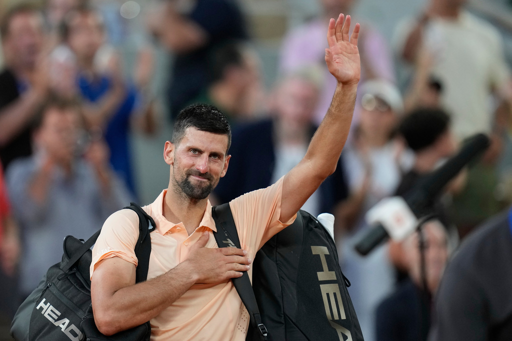 Novak Djokovic of Serbia reacts as he leaves the court after the third round men's singles tennis match against Joao Fonseca of Brazil at the French Open tennis tournament in Paris, Friday, May 29, 2026. (AP Photo/Christophe Ena)