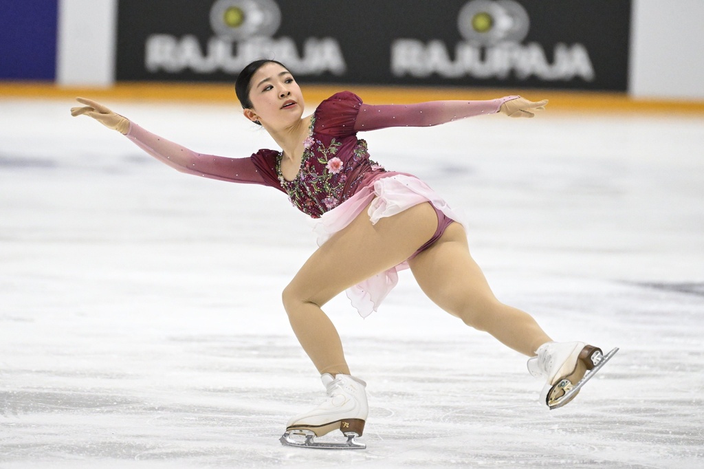 Mone Chiba, of Japan, performs in the women's free skating program at the ISU Grand Prix figure skating event in Helsinki, Finland, Saturday Nov. 22, 2025. (Mikko Stig/Lehtikuva via AP)
