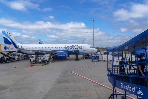FILE - An aircraft of India's budget airline IndiGo is serviced at Kempegowda International Airport in Bangalore, India, Sept. 16, 2022. (AP Photo/Rafiq Maqbool, File) FILE - An aircraft of India's budget airline IndiGo is serviced at Kempegowda International Airport in Bangalore, India, Sept. 16, 2022. (AP Photo/Rafiq Maqbool, File)