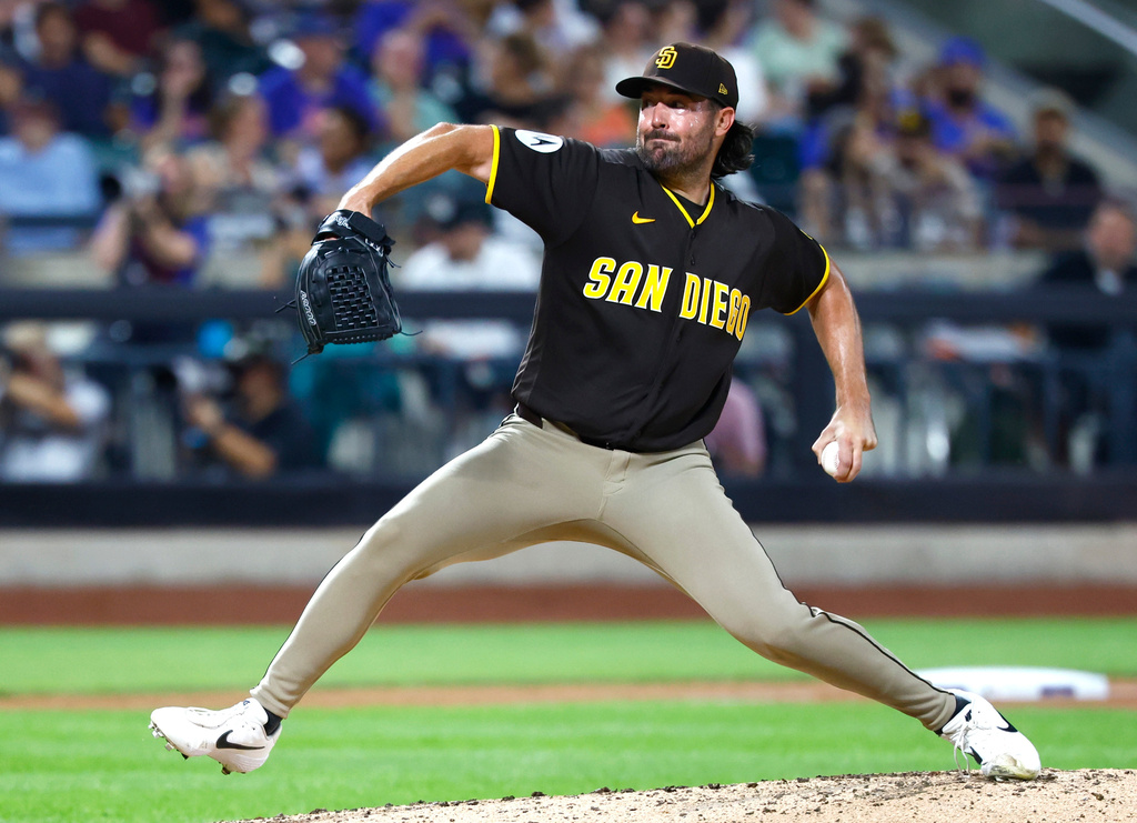 San Diego Padres' Robbie Ray (38) throws against the New York Mets during the fourth inning of a baseball game, Tuesday, Aug. 18, 2026, in New York. (AP Photo/Noah K. Murray)