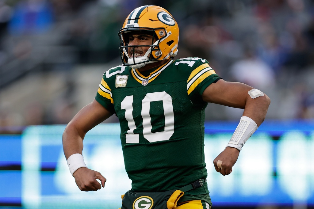 Green Bay Packers' Jordan Love reacts to a touchdown pass during the second half of an NFL football game against the New York Giants Sunday, Nov. 16, 2025, in East Rutherford, N.J. (AP Photo/Adam Hunger)