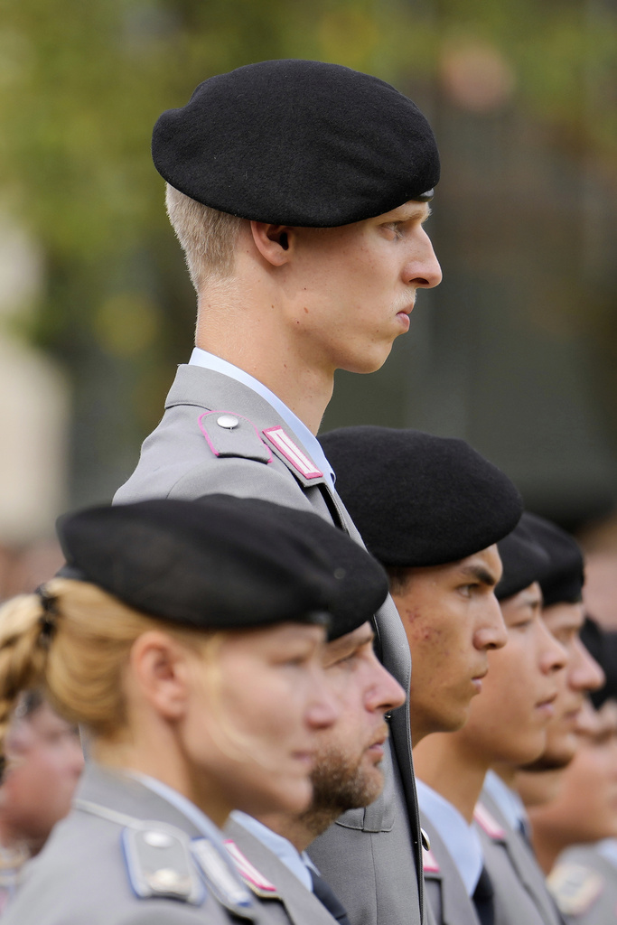 New recruits of the German Army Bundeswehr attend an oath ceremony in Duesseldorf, Germany, Sept. 4, 2025. (AP Photo/Martin Meissner)