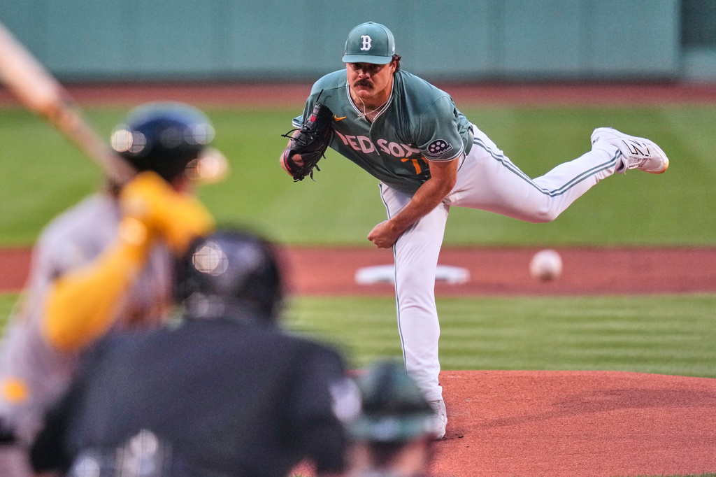 Boston Red Sox starting pitcher Payton Tolle delivers during the first inning of a baseball game against the Athletics, Friday, Aug. 7, 2026, in Boston. (AP Photo/Charles Krupa)