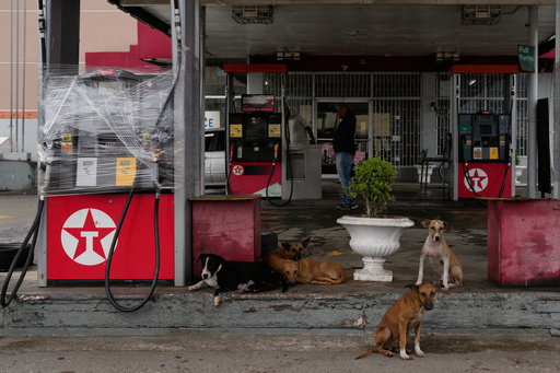 Fuel pumps are covered in plastic at a gas station ahead of the arrival of Hurricane Melissa in Kingston, Jamaica, Sunday, Oct. 26, 2025. (AP Photo/Matias Delacroix) Fuel pumps are covered in plastic at a gas station ahead of the arrival of Hurricane Melissa in Kingston, Jamaica, Sunday, Oct. 26, 2025. (AP Photo/Matias Delacroix)