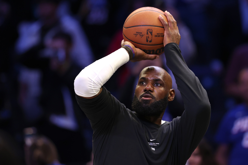 Philadelphia 76ers' LeBron James warms up before a preseason NBA basketball game against the Brooklyn Nets, Thursday, Oct. 8, 2026, in New York. (AP Photo/Pamela Smith)