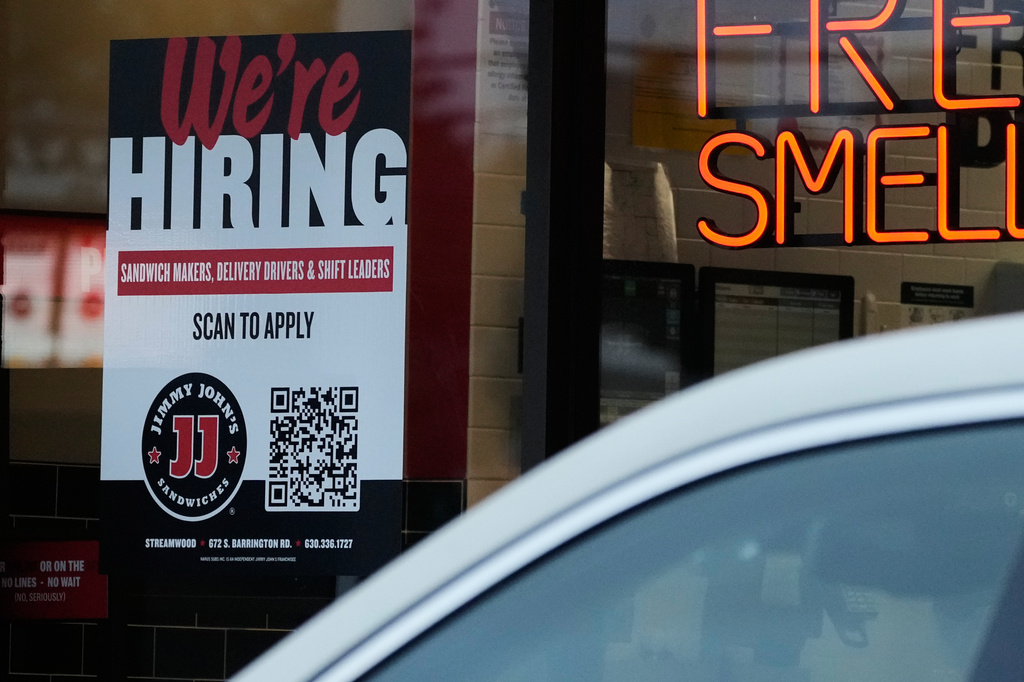 A hiring sign is displayed at a sandwich shop, in Streamwood, Ill., Wednesday, Sept. 16, 2026. (AP Photo/Nam Y. Huh)