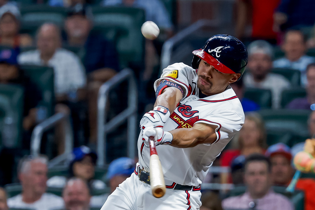 Atlanta Braves designated hitter Drake Baldwin hits a two-run double against the Los Angeles Dodgers during the fourth inning of a baseball game, Wednesday, Aug. 26, 2026, in Atlanta. (AP Photo/Erik S. Lesser)