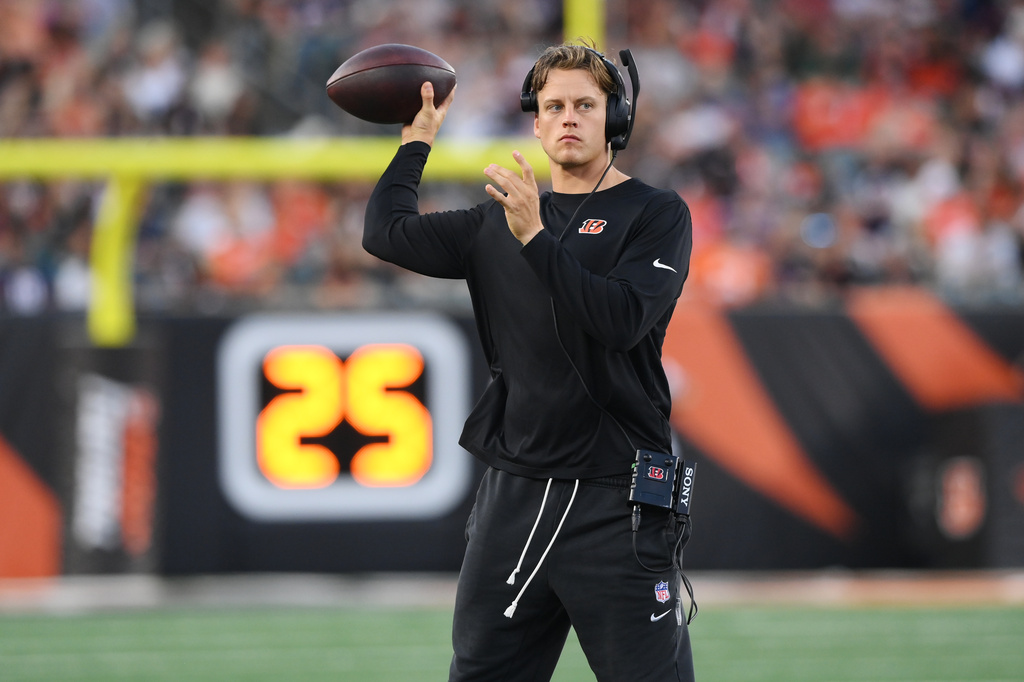 Cincinnati Bengals quarterback Joe Burrow throws during a timeout during the first half of a preseason NFL football game against the Chicago Bears on Saturday, Aug. 22, 2026, in Cincinnati. (AP Photo/Tanner Pearson)