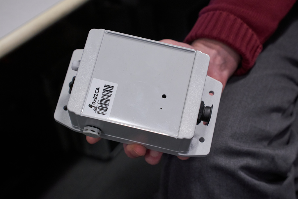 Brian Mayton, a member of the Living Observatory and research affiliate at Massachusetts Institute of Technology Media Lab, holds a prototype of a sensor meant to collect ecological data from wetlands Wednesday, March 25, 2026, at MIT in Cambridge Mass. (Jamie Jiang/MIT Graduate Program in Science Writing via AP)