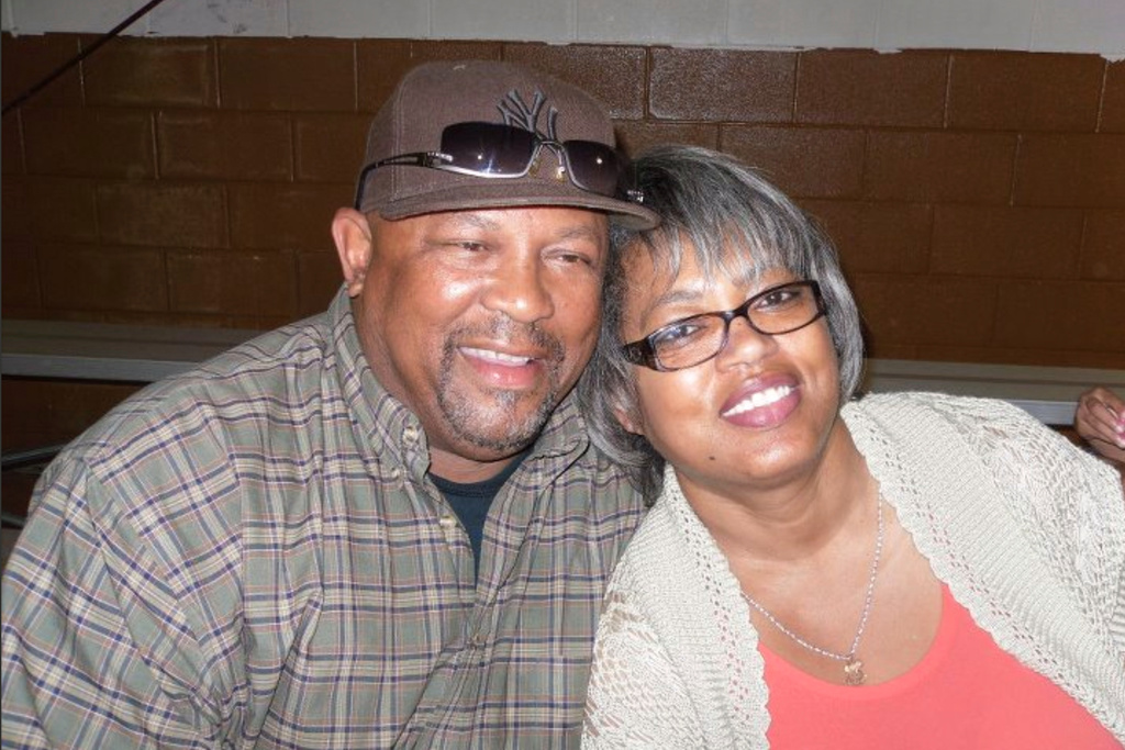 This August 2011 photo provided by Qureshi Law shows Erie Moore, Sr. with his sister, Catherine Moore, at his grandson's birthday in Bastrop, La. (Qureshi Law via AP)