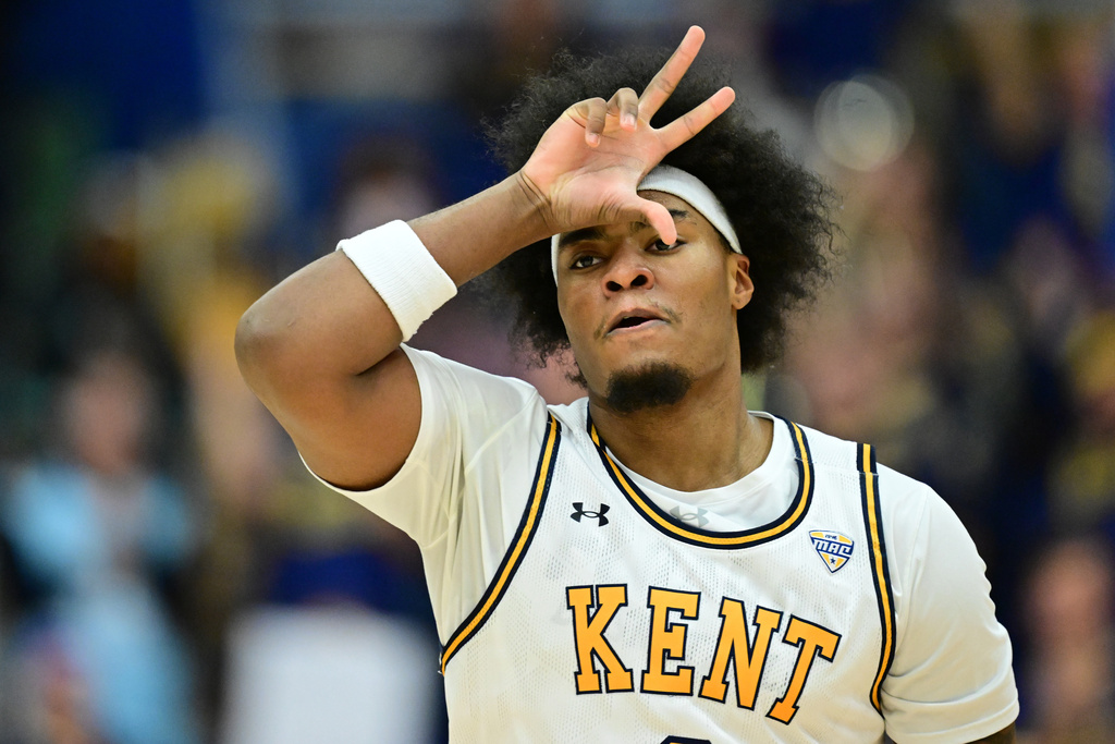 Kent State forward Rob Whaley Jr. celebrates after making a three point basket during the first half of an NCAA college basketball game against Miami, Tuesday, Jan. 20, 2026, in Kent, Ohio. (AP Photo/David Dermer)