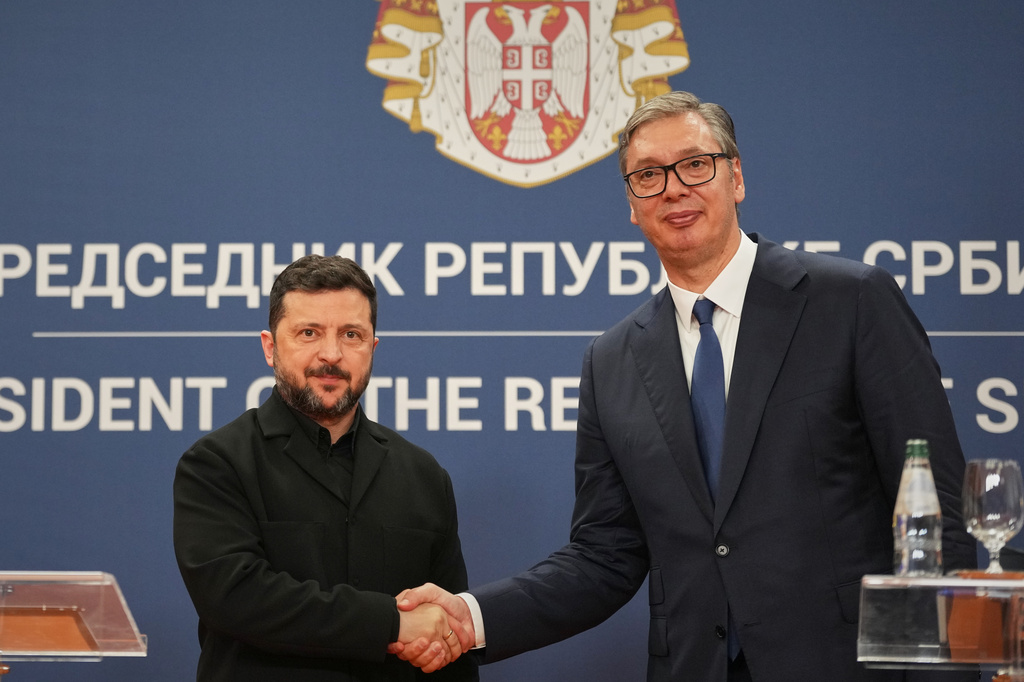 Ukraine's President Volodymyr Zelenskyy shakes hands with his Serbian counterpart Aleksandar Vucic at the Serbia Palace, in Belgrade, Serbia, Saturday, Aug. 8, 2026. (AP Photo/Darko Vojinovic)