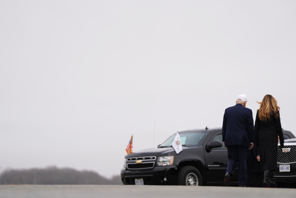 President Donald Trump and first lady Melania Trump depart a casualty return for the soldiers who were killed in a drone strike at a command center in Kuwait after the U.S. and Israel launched its military campaign against Iran, Saturday, March 7, 2026, at Dover Air Force Base, Del. (AP Photo/Julia Demaree Nikhinson)