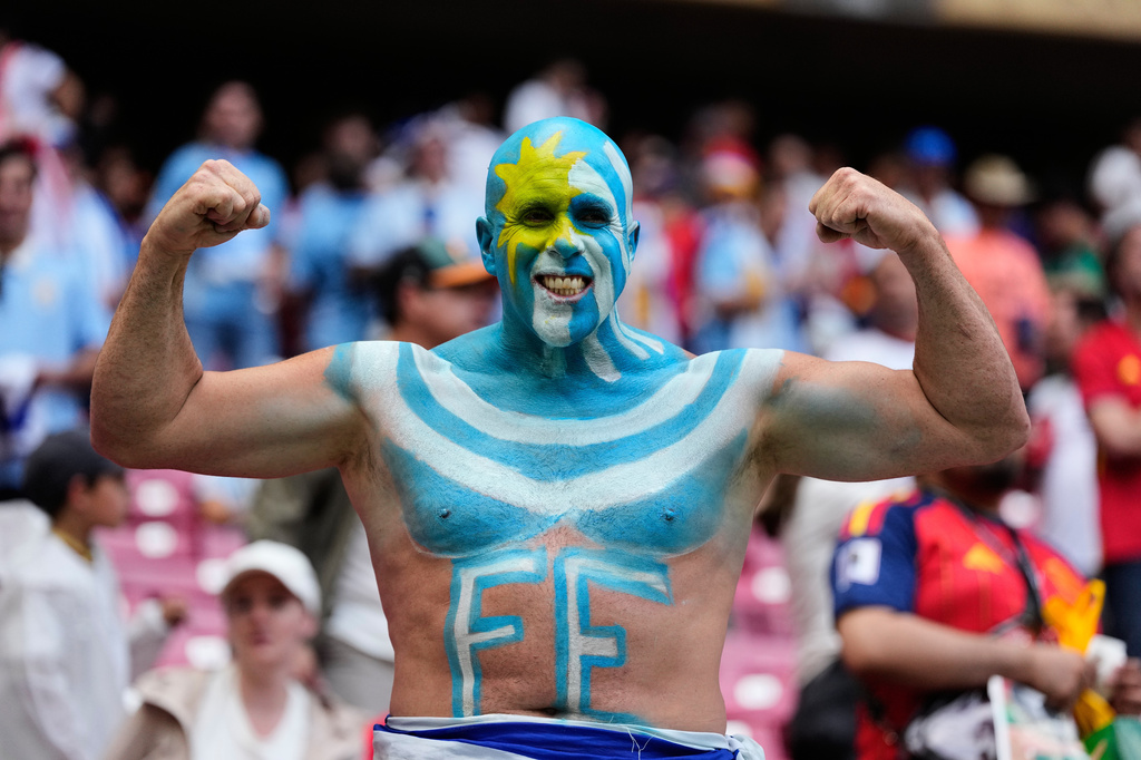 A fan of Uruguay poses prior to the World Cup Group H soccer match between Uruguay and Spain in Zapopan, near Guadalajara, Mexico, Friday, June 26, 2026. (AP Photo/Natacha Pisarenko)