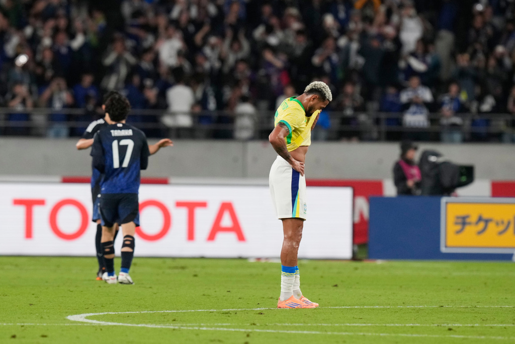 Brazil's Joelinton react after losing against Japan during their friendly soccer match Tuesday, Oct. 14, 2025, in Tokyo. (AP Photo/Eugene Hoshiko)