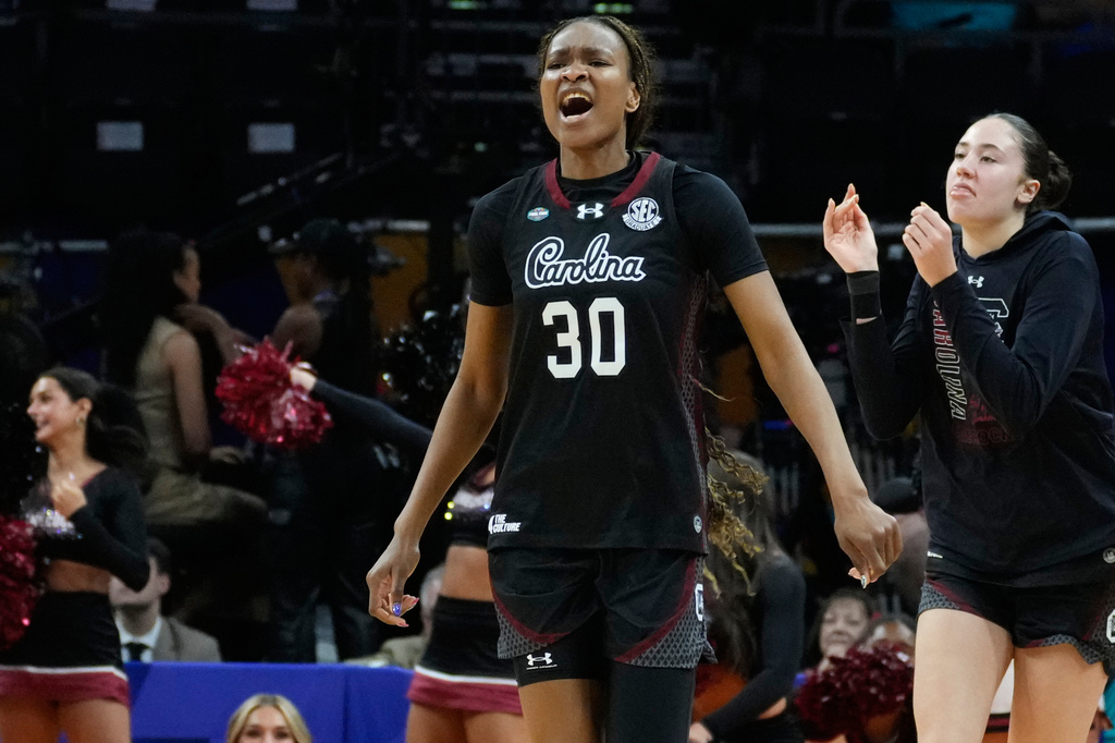 South Carolina forward Maryam Dauda (30) celebrates after a play against UConn during the second half of a woman's NCAA college basketball tournament semifinal game at the Final Four, Friday, April 3, 2026, in Phoenix. (AP Photo/Ross D. Franklin)
