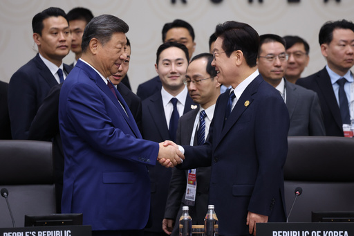 South Korean President Lee Jae Myung, right, shakes hands with Chinese President Xi Jinping at the Asia-Pacific Economic Cooperation (APEC) Economic Leaders' Meeting in Gyeongju, South Korea, Saturday, Nov. 1, 2025. (Yonhap via AP) South Korean President Lee Jae Myung, right, shakes hands with Chinese President Xi Jinping at the Asia-Pacific Economic Cooperation (APEC) Economic Leaders' Meeting in Gyeongju, South Korea, Saturday, Nov. 1, 2025. (Yonhap via AP)