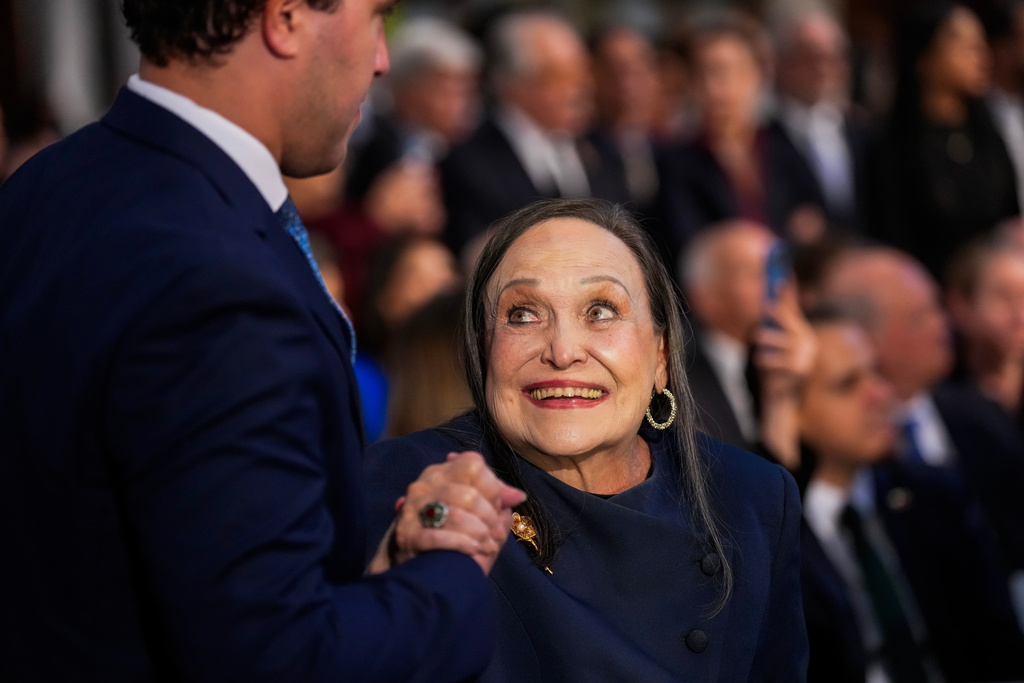 Corina Parisca de Machado, mother of Nobel Peace Prize laureate Maria Corina Machado, reacts during the Nobel Peace Prize award ceremony at Oslo City Hall, in Oslo, Norway, Wednesday Dec. 10, 2025. (Ole Berg-Rusten/NTB Scanpix, Pool via AP)