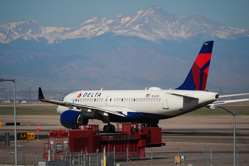 FILE - A Delta Airlines jetliner taxis to a runway for take off from Denver International Airport, March 20, 2026, in Denver. (AP Photo/David Zalubowski, File)