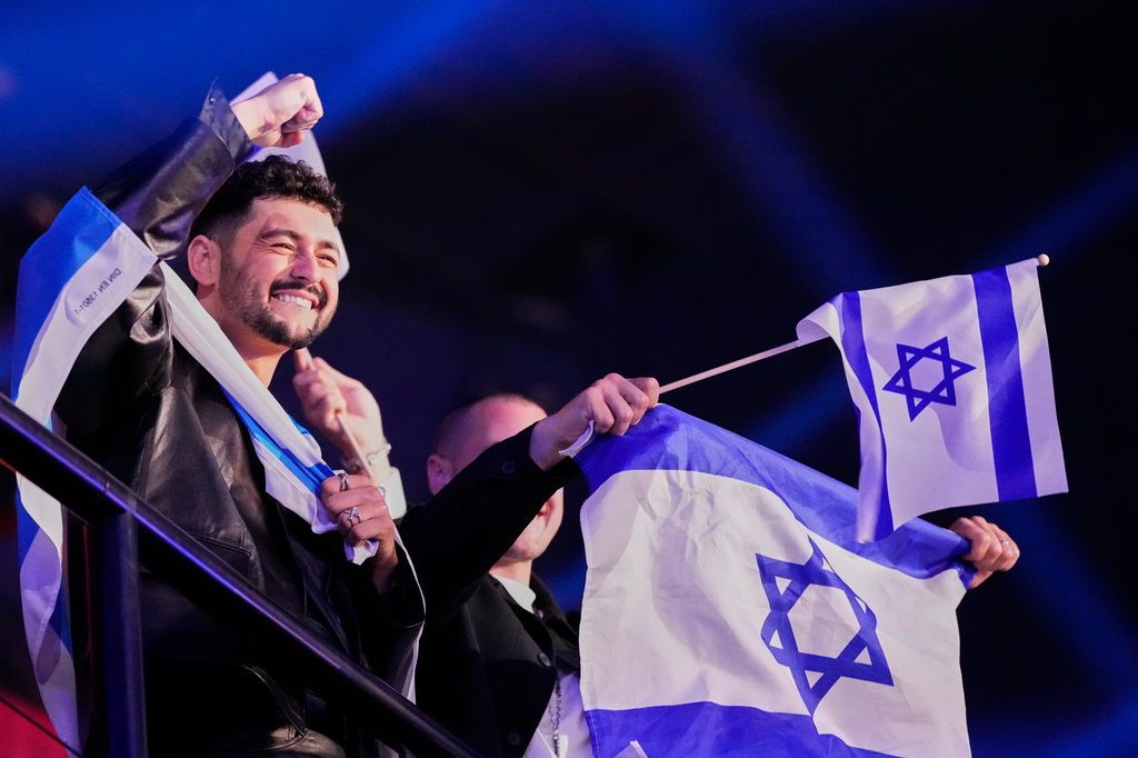 Noam Bettan from Israel performs the song "Michelle" reacts to the vote totals being announced during the first semifinal of the 70th Eurovision Song Contest in Vienna, Austria, Tuesday, May 12, 2026. (AP Photo/Martin Meissner)
