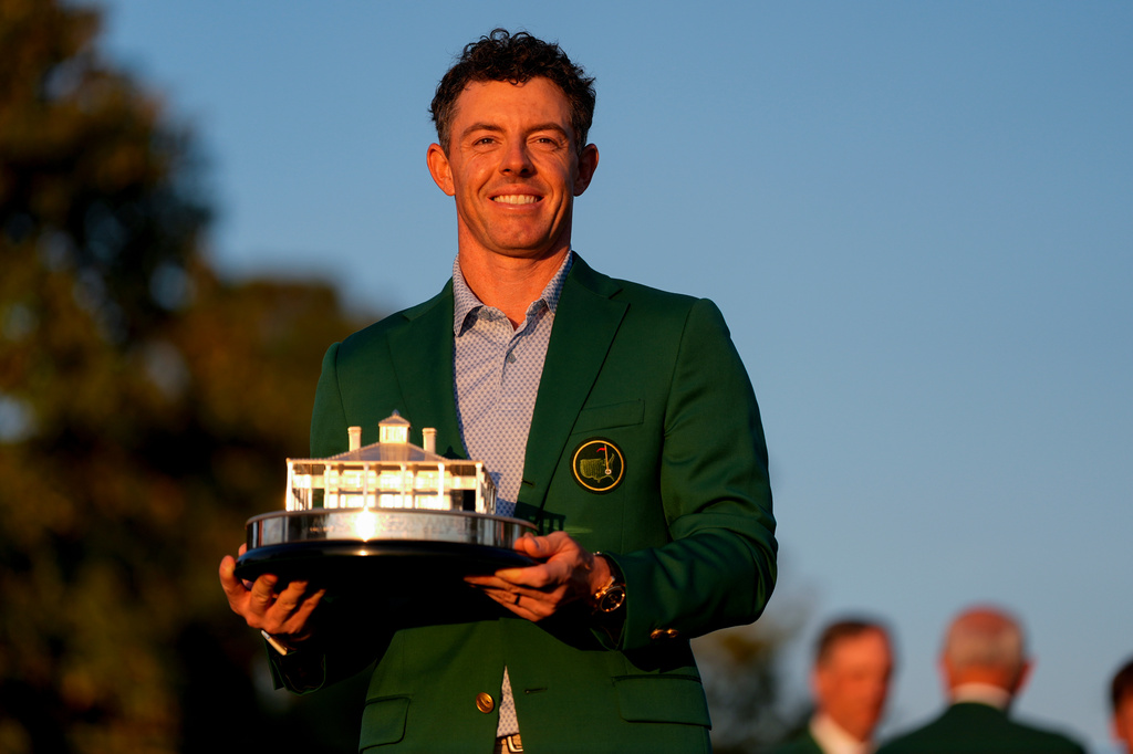 Rory McIlroy, of Northern Ireland, holds the trophy after winning the Masters golf tournament at the Augusta National Golf Club, Sunday, April 12, 2026, in Augusta, Ga. (AP Photo/Ashley Landis)
