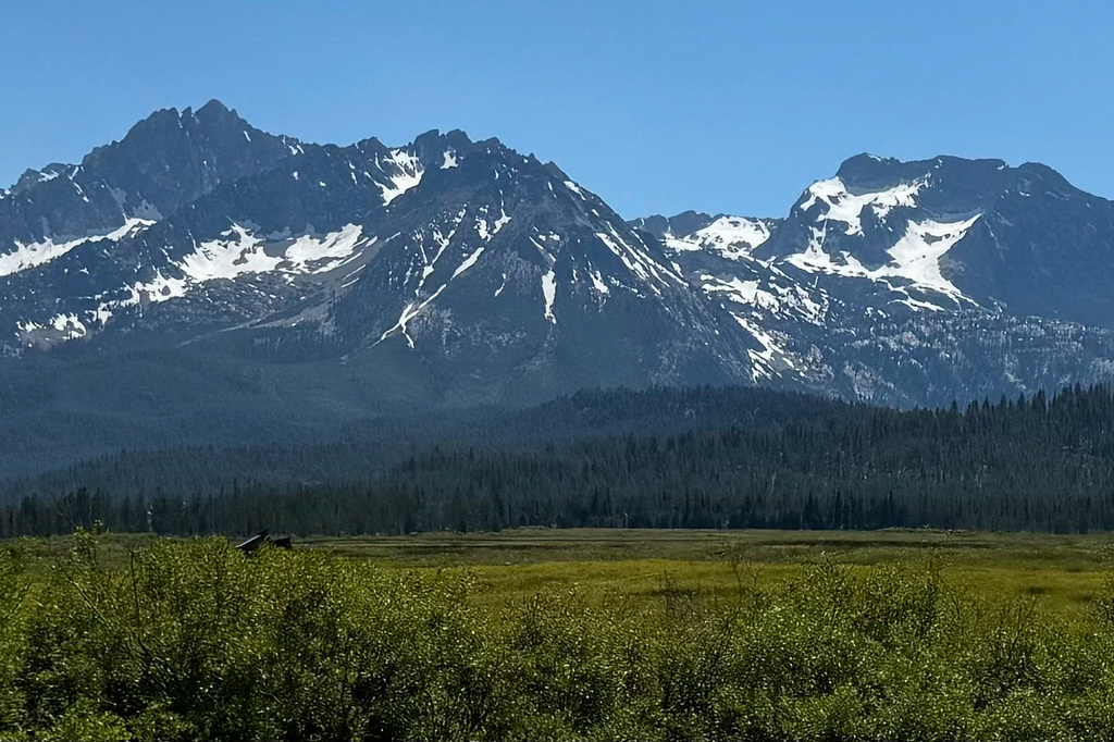 FILE - Snow dots the Sawtooth Mountains in the Sawtooth National Forest in central Idaho, June 23, 2024. (AP Photo/Rebecca Boone, File)