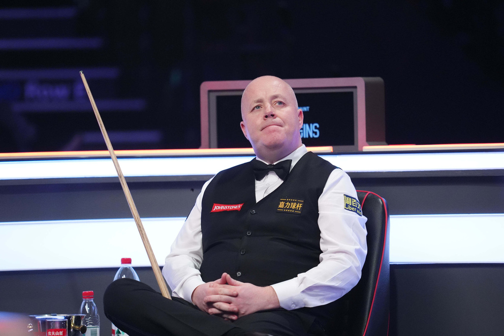 Scotland's John Higgins in action against England's Judd Trump on day seven of the 2026 Masters Snooker at Alexandra Palace, London, Saturday Jan. 17, 2026. (Adam Davy/PA via AP)
