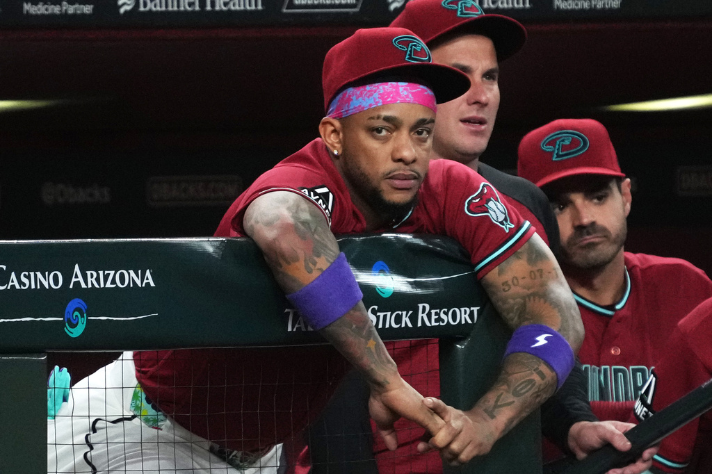 Arizona Diamondbacks' Ketel Marte watches game action from the dugout against the Los Angeles Dodgers in the fifth inning of a baseball game, Wednesday, June 3, 2026, in Phoenix. (AP Photo/Rick Scuteri)