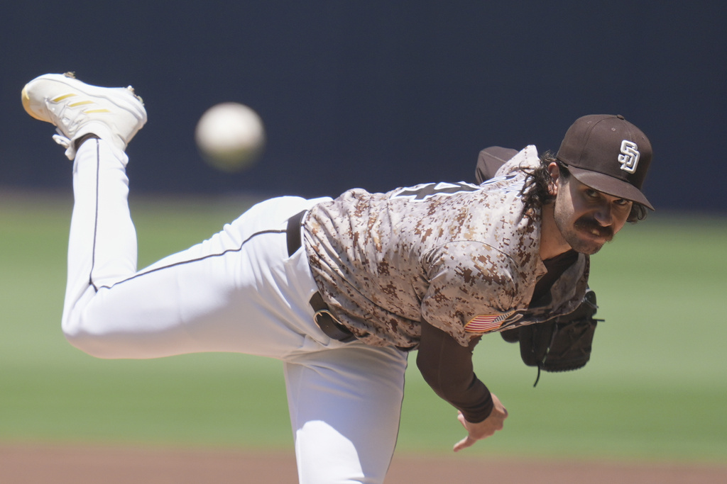 San Diego Padres starting pitcher Dylan Cease works against a Boston Red Sox batter during the first inning of a baseball game Sunday, Aug. 10, 2025, in San Diego. (AP Photo/Gregory Bull)