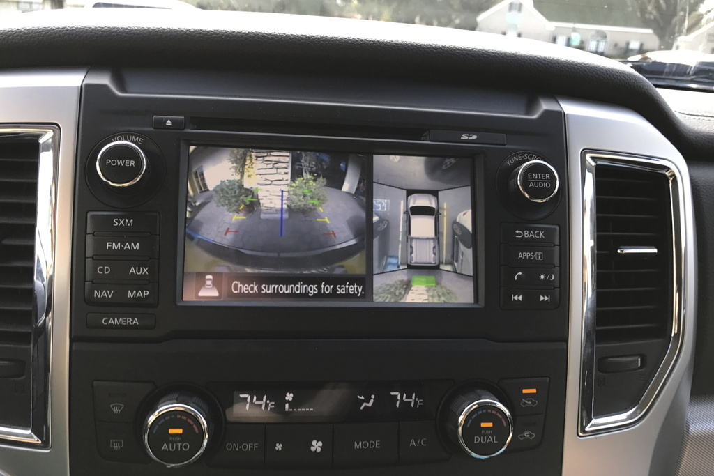 This photo provided by Edmunds shows a surround-view camera in operation in a 2016 Nissan Titan pickup, highlighting how it can make maneuvering in tight spots easier. (Courtesy of Edmunds via AP)