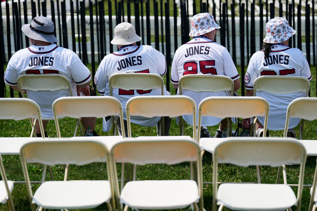 Andruw Jones supporters wait for the start of the Baseball Hall of Fame induction ceremony in Cooperstown, N.Y., Sunday, July 26, 2026. (AP Photo/Seth Wenig)