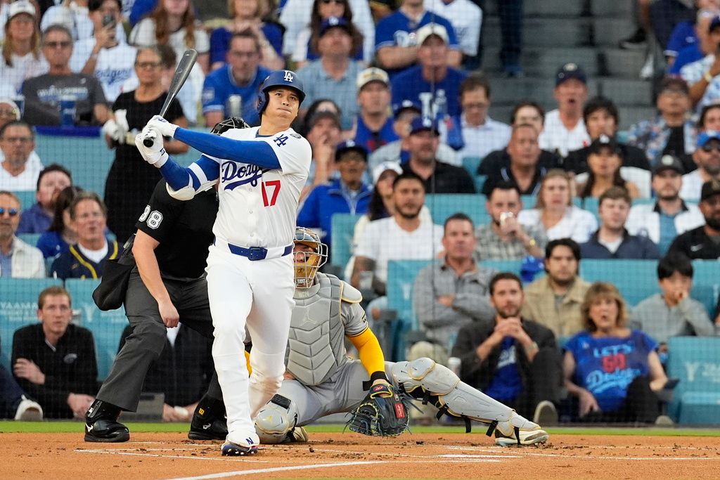 Los Angeles Dodgers' Shohei Ohtani watches his home run against the Milwaukee Brewers during the first inning in Game 4 of baseball's National League Championship Series, Friday, Oct. 17, 2025, in Los Angeles. (AP Photo/Mark J. Terrill)