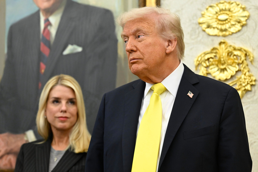 FILE - President Donald Trump and Attorney General Pam Bondi listen as FBI Director Kash Patel speaks during an event in the Oval Office at the White House, Oct. 15, 2025, in Washington. (AP Photo/John McDonnell, File)