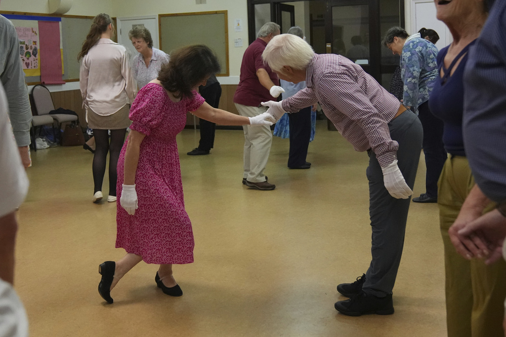 Members of the Hampshire Regency Dancers practice dance in Winchester, England, Sept. 10, 2025, ahead of the 10 days Jane Austen Festival starting on Friday. (AP Photo/Joanna Chan)