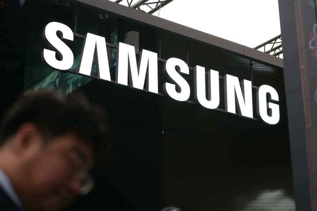 A logo of Samsung Electronics is seen at an exhibition hall for the Asia-Pacific Economic Cooperation (APEC) in Gyeongju, South Korea, Thursday, Oct. 30, 2025. (AP Photo/Lee Jin-man)