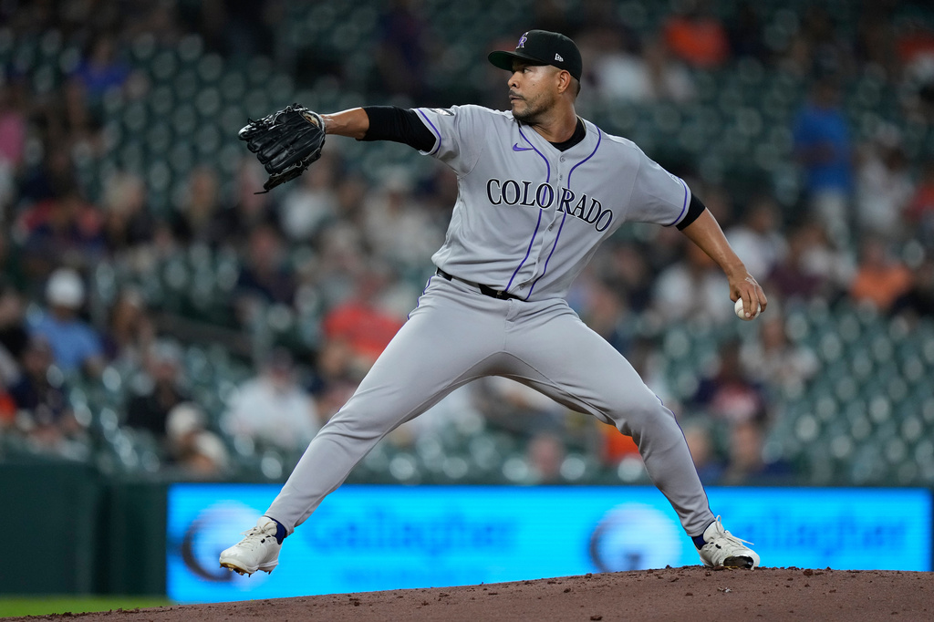 Colorado Rockies pitcher Jose Quintana delivers during the first inning of a baseball game against the Houston Astros, Wednesday, April 15, 2026, in Houston. (AP Photo/Kevin M. Cox)