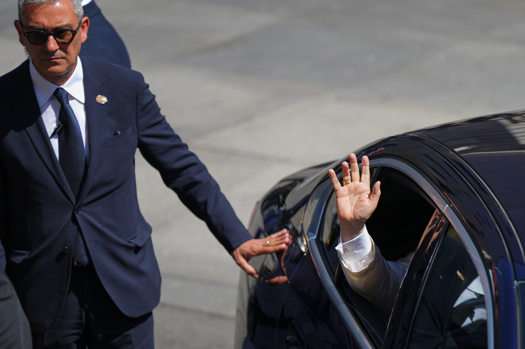 Pope Leo XIV waves as he exits the Spanish parliament in Madrid, Spain, Monday, June 8, 2026. (AP Photo/Manu Fernandez)