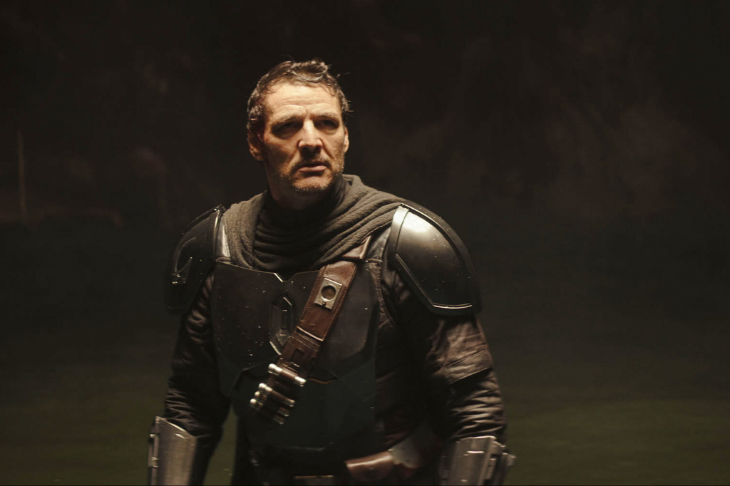 This image released by Disney shows The Mandalorian, portrayed by Pedro Pascal in a scene from Lucasfilm's "Star Wars: The Mandalorian and Grogu." (Lucasfilm Ltd. - Disney via AP)