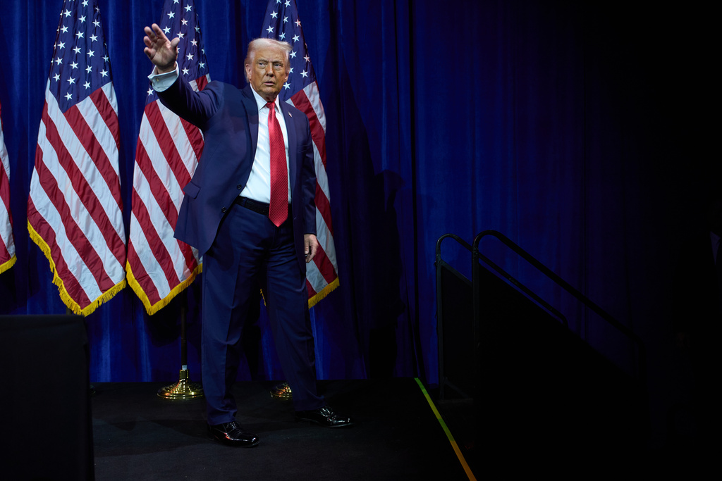 President Donald Trump waves as he walks off stage after speaking to House Republican lawmakers during their annual policy retreat, Tuesday, Jan. 6, 2026, in Washington. (AP Photo/Evan Vucci)